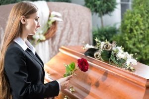 Woman attending the funeral of a loved one