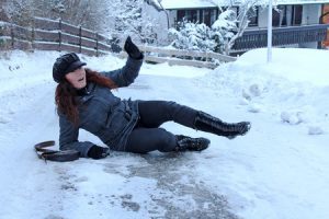 Women slipping on ice. 