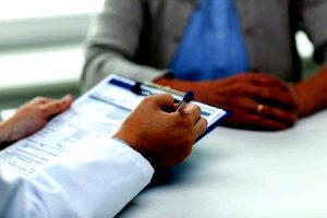 Medical negligence solicitors for Wigan work on a case.