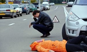 Pedestrian hit by a car at a junction