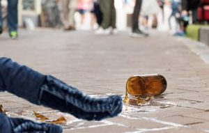 Tripped over broken glass bottle