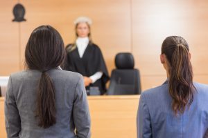 Two Solicitors Listen To A Judge