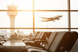 IMAGE OF A PLANE TAKING OFF AT AN AIRPORT