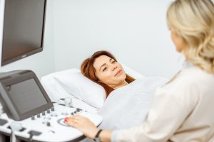 A woman getting an ultrasound.