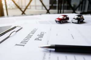 Insurance policy wording on a piece of paper on a desk