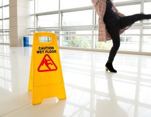 person slipping on a wet floor 