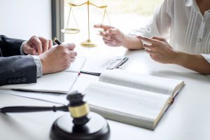 A solicitor advising their client on aviva personal injury claims after a road traffic collision