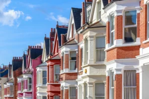 A row of colourful terraced houses.