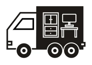  a black and white lorry or HGV containing a desktop, desk and cupboard