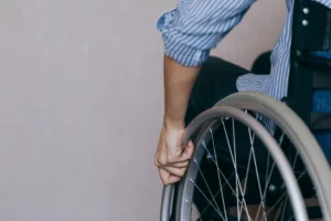 A person in a wheelchair paralysed from the waste down after a spinal cord injury