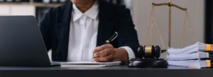 A solicitor preparing documents during the caravan park and camp site claims process