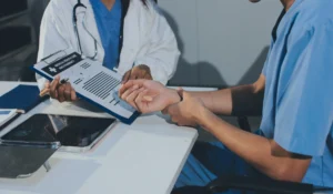 A doctor is having a consultation about an injury