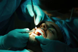 Someone receiving dental treatment.