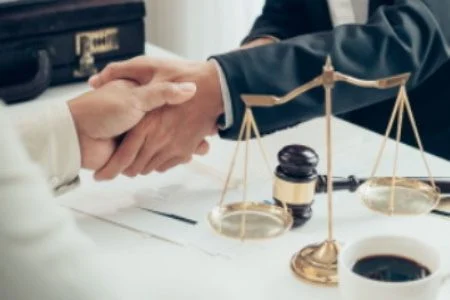 a personal injury solicitor in dewsbury with a client